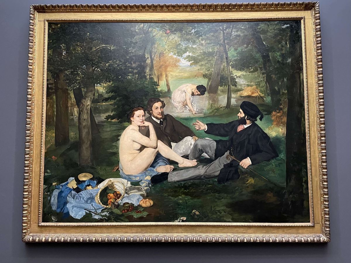 エドゥアール・マネ《草上の昼食》1862-63年　撮影：和田彩花　「暖かくなってきたパリでは、多くの人が公園でピクニックをしています。ピクニック文化はいつどこでできたものだろう？」