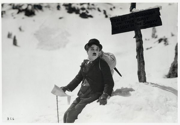 THE GOLD RUSH MOTION PICTURE (C) ROY EXPORT S.A.S. ALL RIGHTS RESERVED. THE GOLD RUSH DRAMATIC COMPOSITION: COPYRIGHT (C) 1996 THE ROY EXPORT COMPANY LIMITED. ALL RIGHTS RESERVED. CHARLES CHAPLINR AND THE LITTLE TRAMP TM ARE TRADEMARKS AND SERVICE MARKS OF BUBBLES INC. S.A. OR ROY EXPORT S.A.S, AS APPLICABLE, USED WITH PERMISSION/(C)Illustrated by Laurent Pons / TROIKA/(C)Roy Export SAS