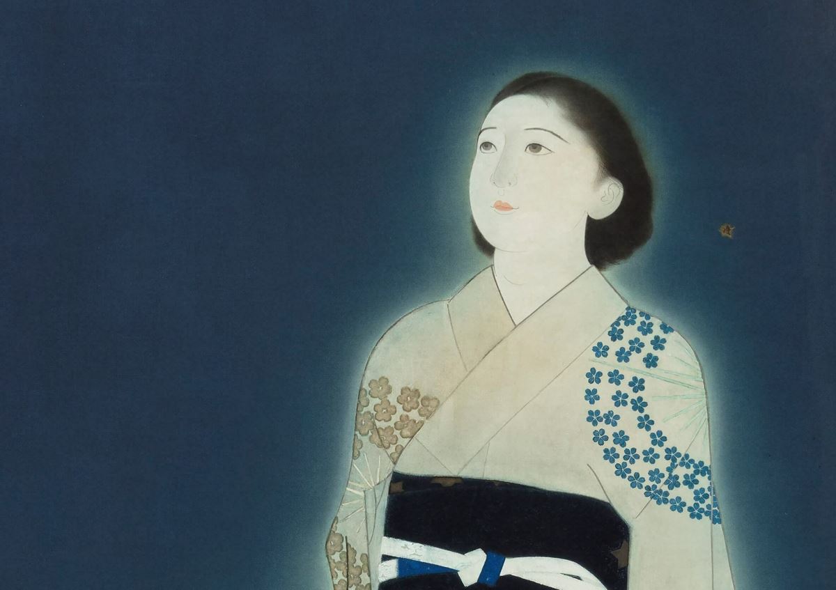 女性の右肩の上には輝く星が